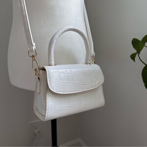White croc print top handle bag​​